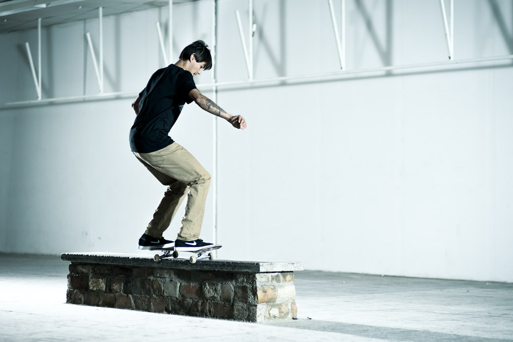Denny Pham - Skateboard Trick 50-50 Curb